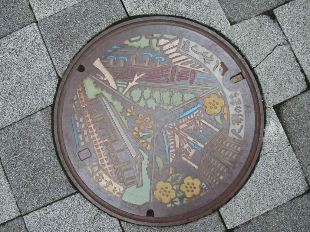 人形のまちいわつき蓋@岩槻駅