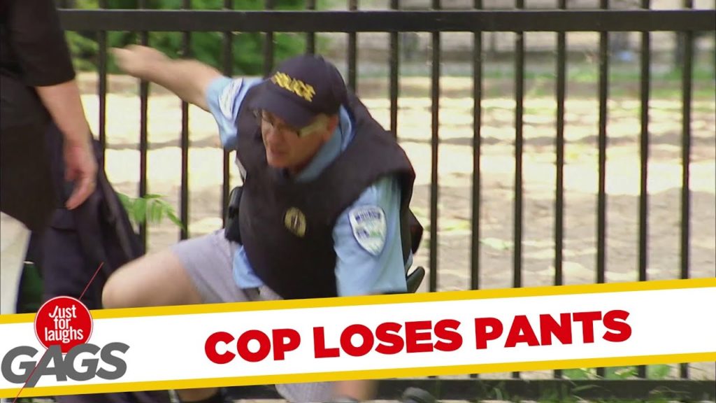 Cop Loses His Pants Climbing Over Fence!