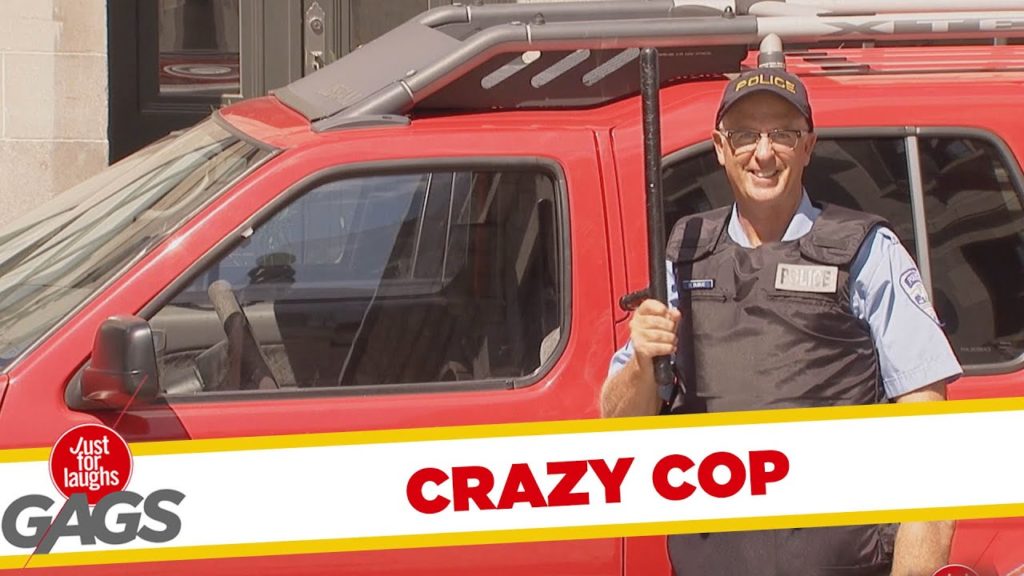 Crazy Cop Smashes Car Window